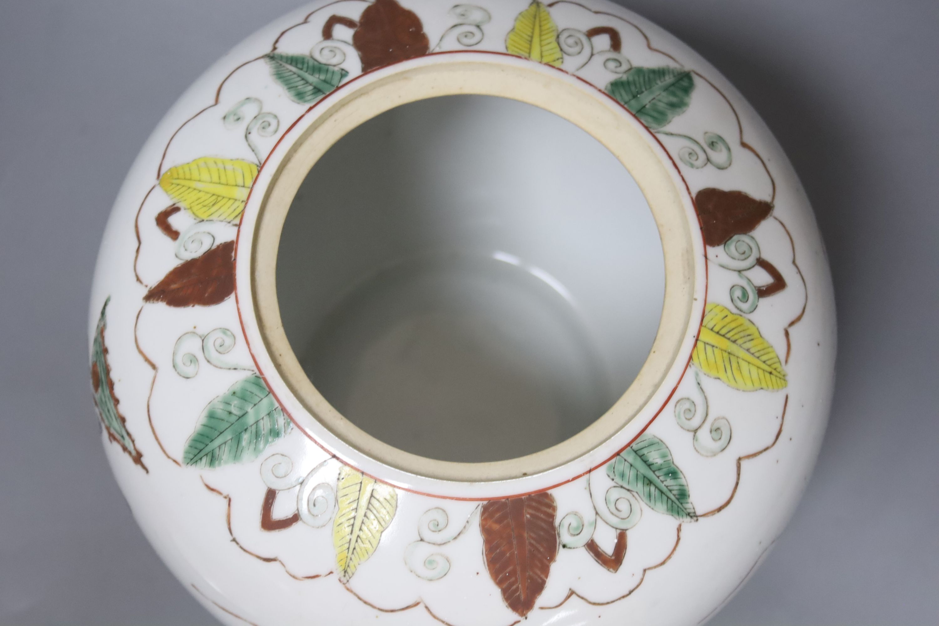 Three large 20th century Chinese porcelain famille verte jars and covers, tallest 21cm